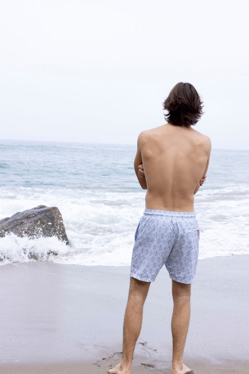 The Andros Bottom is a classic style men's board short. It features custom wax-dipped cords and a zipper back pocket that make it unique and elevated. Created to be worn anywhere under the sun, with a drawstring waistband this style is comfortable and, it's made out of a quick dry material that is light weight and durable.