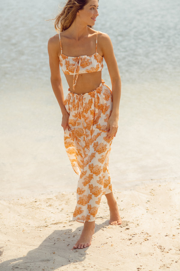 The Atlas Top is your easy and comfortable crop top featuring an elastic waist band, an optional tie and adjustable straps. It makes for the perfect vacation look. Pair with our matching Kavala skirt to really make this look pop.