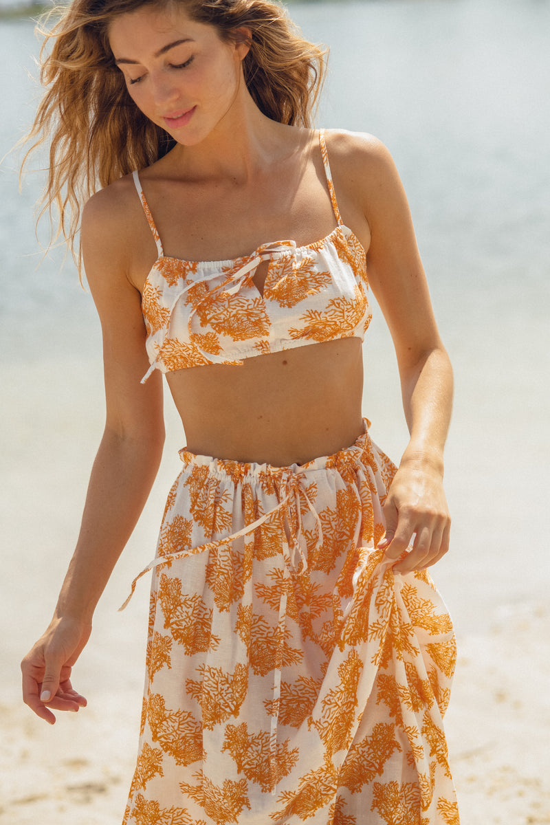 The Atlas Top is your easy and comfortable crop top featuring an elastic waist band, an optional tie and adjustable straps. It makes for the perfect vacation look. Pair with our matching Kavala skirt to really make this look pop.